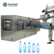 Machine de remplissage d'eau pure minérale de bouteille d'animal familier de type rotatif entièrement automatique prix d'équipement d'usine d'embouteillage